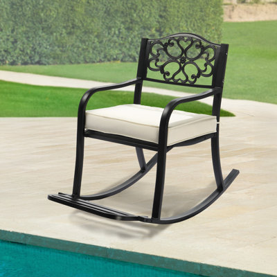 Black Iron Rocking Chair With Floral Backrest And Off-White Cushion by Winston Porter
