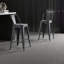 Ensemble de tabourets de bar industriels noirs patinés - dossier baquet et conception à 4 pieds