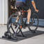Entraîneur de vélo, résistance à 6 niveaux, roues de 26 à 29 po et 700C, support stationnaire magnétique pliable pour vélo d'intérieur avec brochette à dégagement rapide et bloc de rehausse de roue avant pour vélos de route