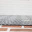 Tapis intérieur / extérieur noir / blanc à motif géométrique Ammons-421938228