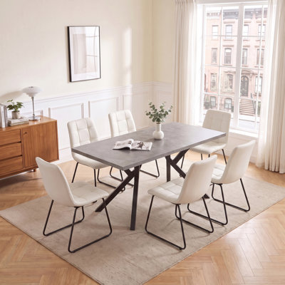 Ensemble de salle à manger extensible 7 pièces comprenant une table rectangulaire en MDF, des pattes de table en métal et 6 chaises de salle à manger rembourrées en PU.