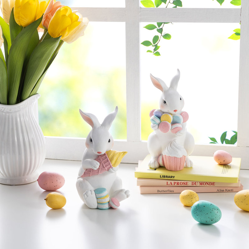 Ensemble de 2 lapins de Pâques en résine tenant un décor de table Macaron