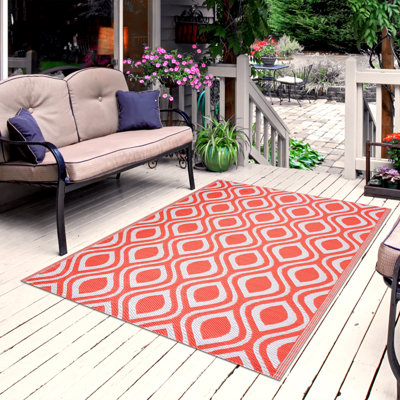 Tapis de sol réversible intérieur / extérieur 100% plastique recyclé Corrigan Studio® - résistant aux intempéries, à l'eau, aux taches, à la décoloration et aux rayons UV - Venise - orange / blanc