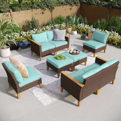 Ensemble de mobilier d'extérieur en osier 8 pièces, ensemble modulaire avec coussins et table de foyer Argyri