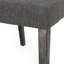 Chaise de salle à manger en tissu gris anthracite avec un design rembourré lisse libéral et des pieds fuselés stables