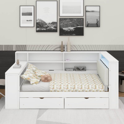 Lit plateforme en bois pleine grandeur avec tablettes de rangement, tiroirs, station de charge, DEL, bureau et tête de lit tapissier