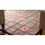Tapis unique de 9 pi x 12 pi en rouge / bleu / ivoire / brun