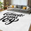 Tapis d'intérieur chaud, lavable à la machine, noir, avec l'inscription « Confort et Joie » à la main.-459266514