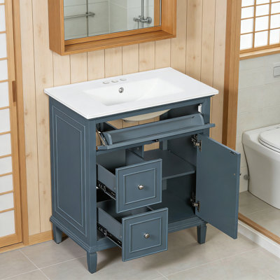 Meuble-lavabo de salle de bain avec lavabo, un tiroir rabattable et deux tiroirs