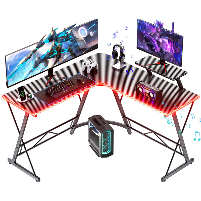 Bureau de jeu en coin en L 51 po noir, surface en fibre de carbone avec lumières DEL, haut-parleurs intégrés et support pour écran