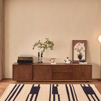 Floor-to-ceiling TV cabinet with simple design