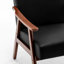 Chaise d'appoint Ryno Mid-Century, structure en bois naturel, similicuir noir