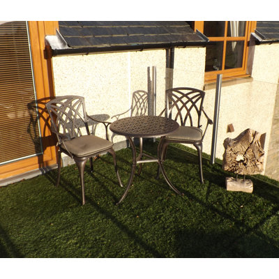 Ryne 2 - Person Patio Dining Set Umbrella Hole Included Round Table with Cushions Included