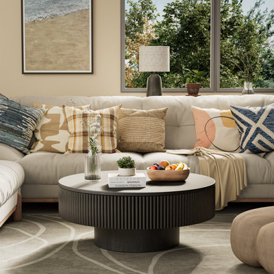 35" wide solid oak circular coffee table with solid wood and wax wood design.