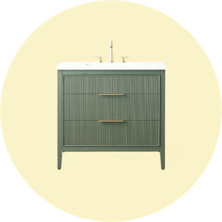 Meuble-lavabo cannelé vert sauge avec poignées dorées et comptoir blanc