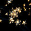 Arbre de Noël artificiel avec lumières en fleurs de cerisier-555561439-555561432