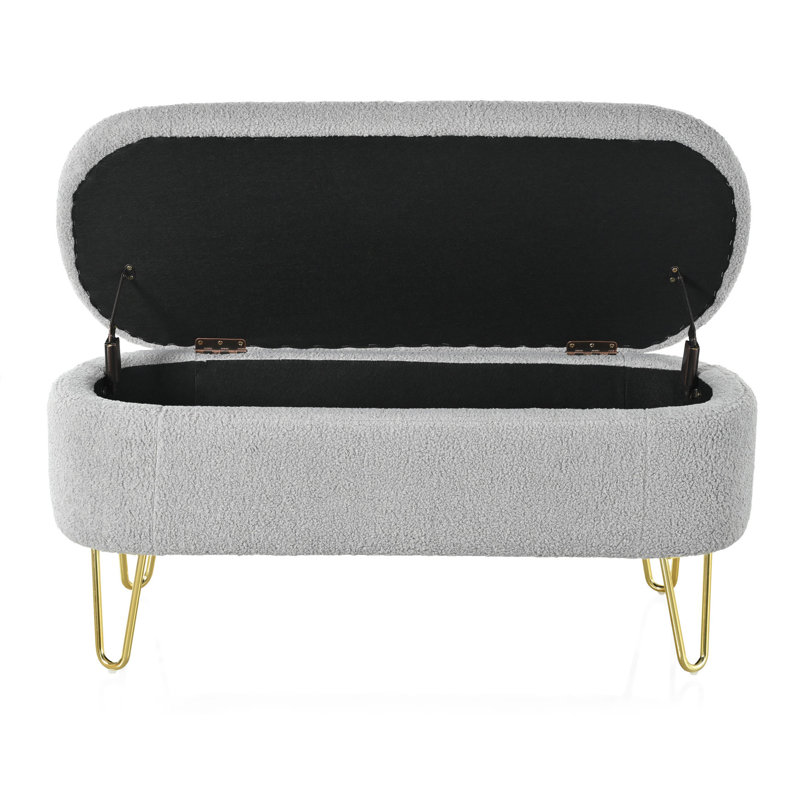Banc de rangement pour la chambre à coucher avec pieds rembourrés et métalliques gris pour un intérieur moderne de forme ovale, support robuste et spacieux