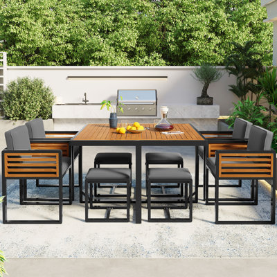 Ensemble de salle à manger de jardin en bois d'acacia de 9 pièces GO, ensemble de patio extérieur peu encombrant, 4 chaises rembourrées et 4 repose-pieds et 1 table carrée, pour la cour, le jardin, la terrasse et le bord de la piscine, gris