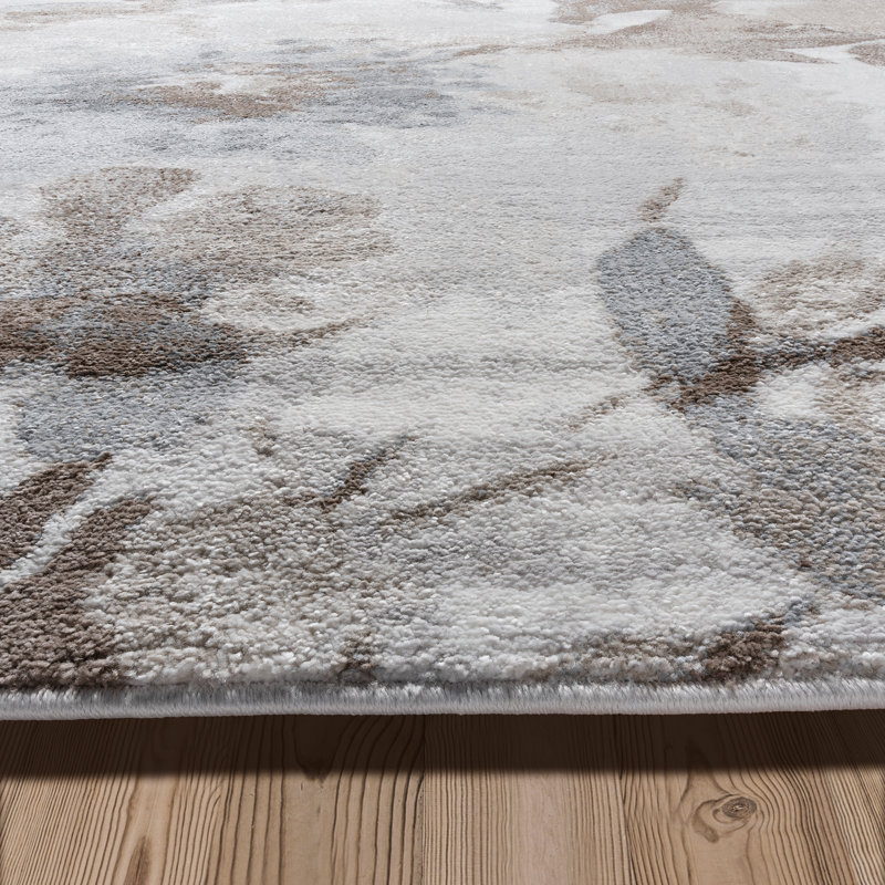 Gray and Beige Floral 8' x 10' Synthetic Area Rug