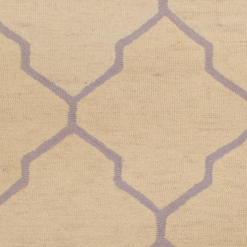 Tapis ivoire en laine touffeté à la main