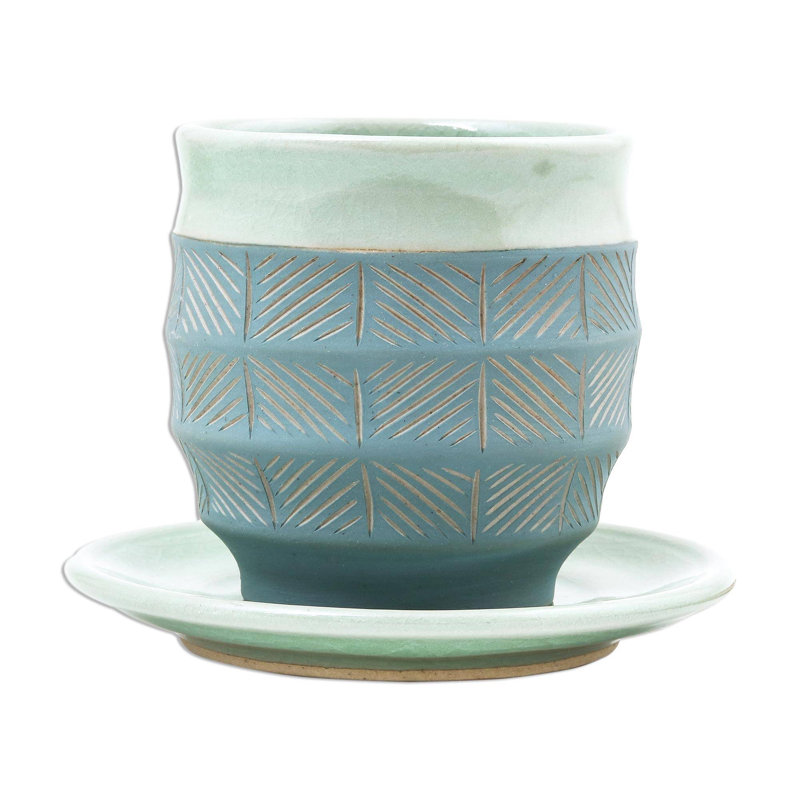 Ceramic Teacup and Saucer