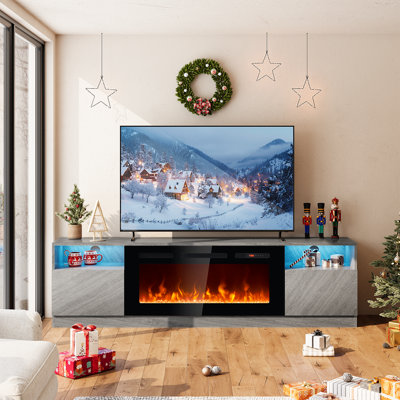 Meuble télé Janyriah pour téléviseur de 80 po ou moins avec foyer de 36 po inclus