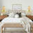 1-Light Brass Armed Wall Sconce with Pleated Fabric Shade 