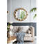 Miroir mural rond en métal avec détails dorés