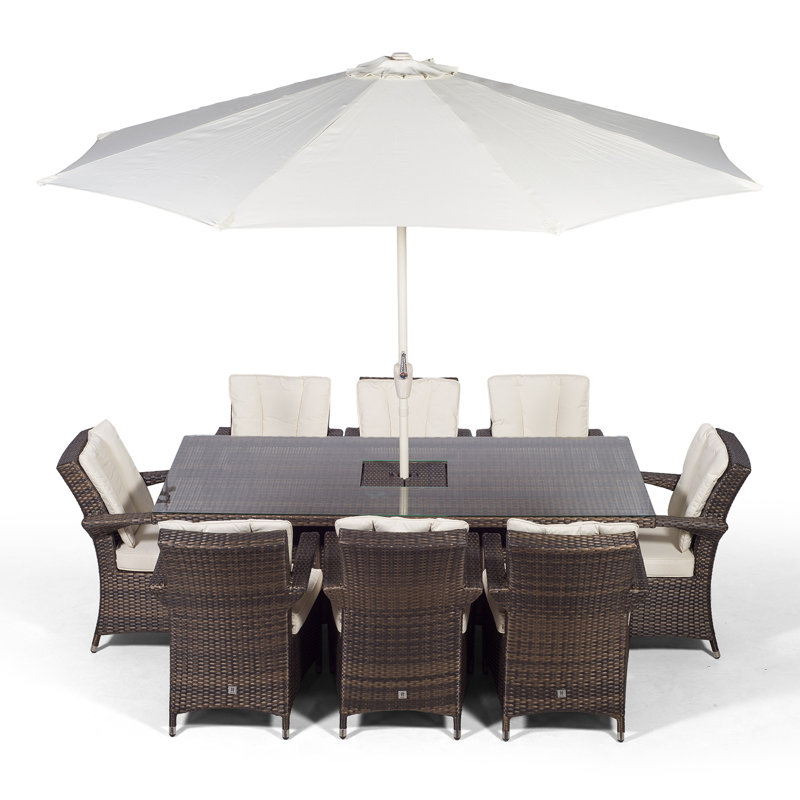 Karas 8 - Person Wicker Patio Dining Set with Rectangular Table , Cushions Included, Brown
