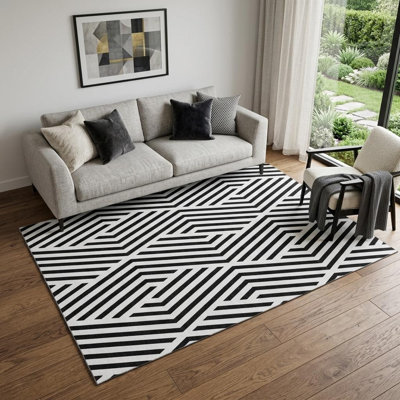5' X 8' Black And Ivory Geometric Washable Area Rug With UV Protection