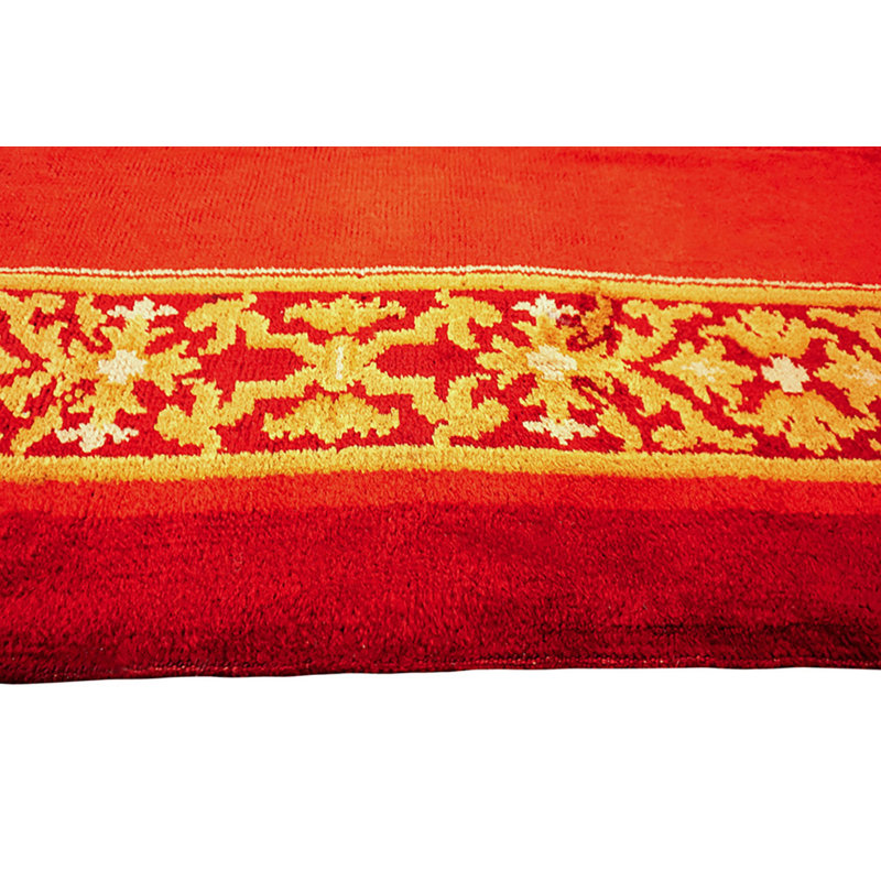 Tapis antique noué à l'aller