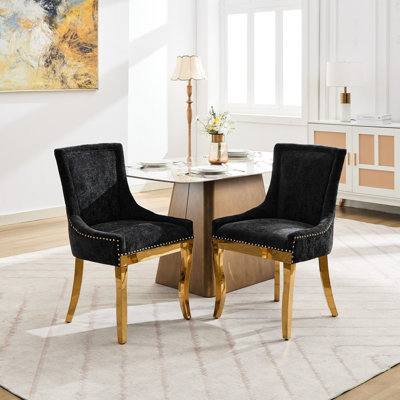 Chaises de salle à manger modernes en chenille noire, 2 avec structure monobloc et siège en mousse, pieds courbés à garniture dorée pour le confort de la pièce