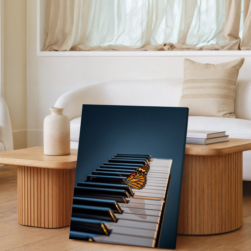 Toile, vue rapprochée d'un clavier de piano avec un art mural contrastant entre les clés en noir brillant et blanc mat