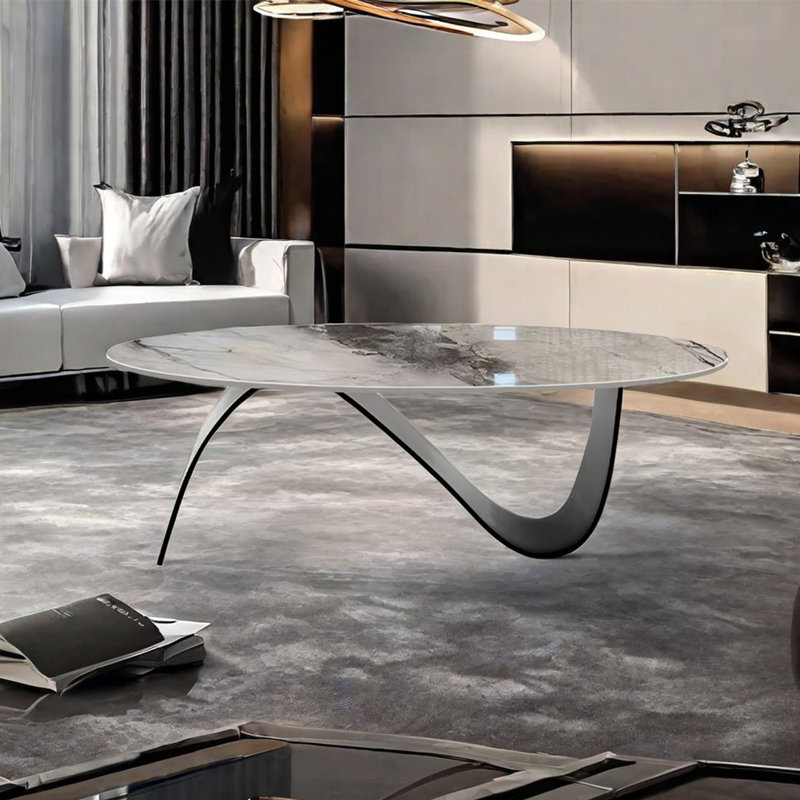 Simple stainless steel oval rock table, 16.5" H x 55.1" L x 31.5" W