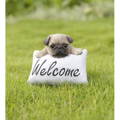 Statue carlin avec enseigne welcome