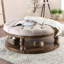 Table basse ronde en bois de style rustique avec finition gris antique, pieds tournés et tablette ouverte pour un rangement élégant