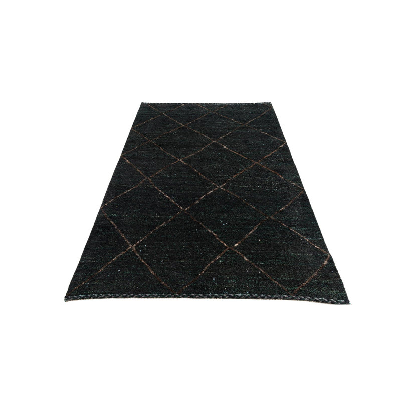 Tapis noir Kalmanovitz