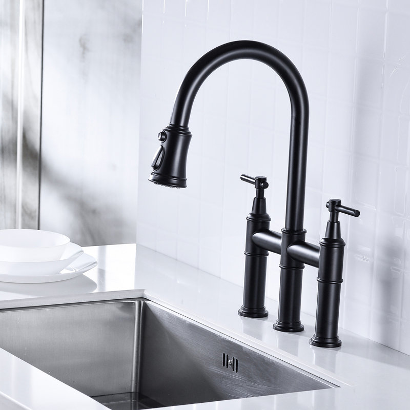 Robinet de cuisine noir mat avec design escamotable - commande à deux poignées pour un débit d'eau et une température idéaux.
