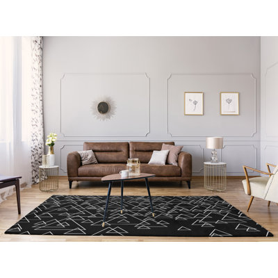 Tapis de zone noire en triangles dispersés