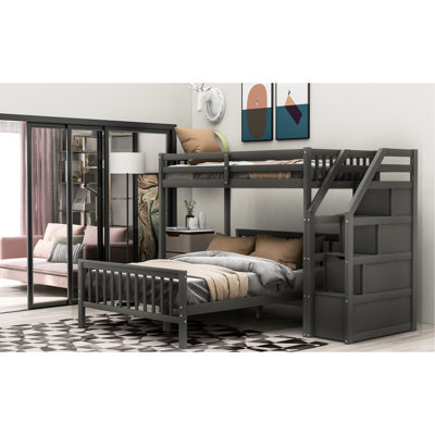 Lit superposé gris simple au-dessus d'un lit double, avec mezzanine en bois de pin, assure la stabilité