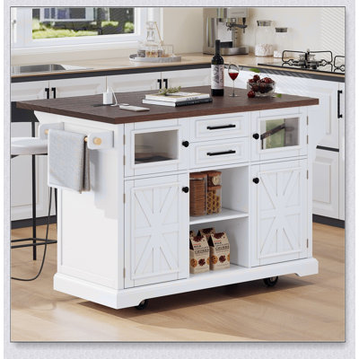 Îlot de cuisine rustique avec abattant, prises de courant et grand rangement sur roulettes, parfait pour un décor de maison de campagne moderne