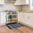 Kivett Caliente Navy and Ivory Indoor Outdoor Machine Washable Area Rug-1706871826