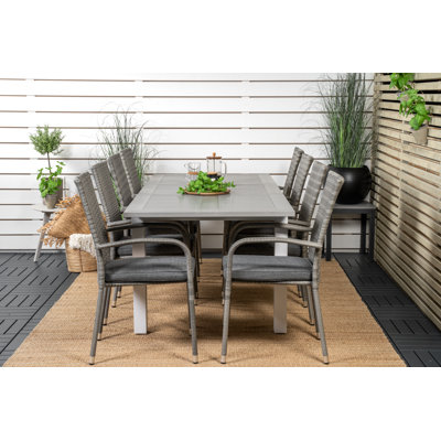 Jayesh 8 - Person Patio Dining Set with Extendable Rectangular Table , Cushions Included