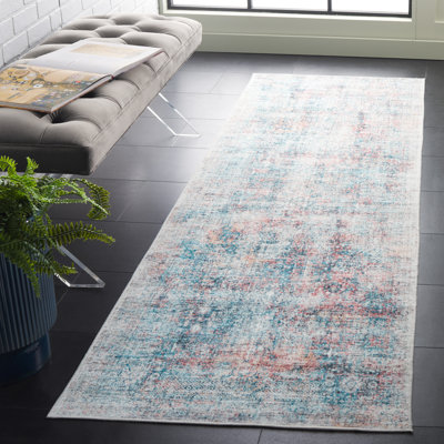 Tapis oriental lavable à la machine Jeralee