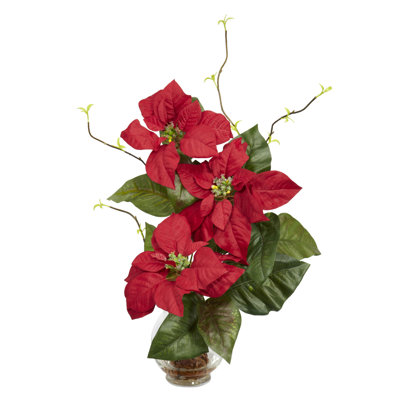 Arrangement floral de poinsettias dans un vase