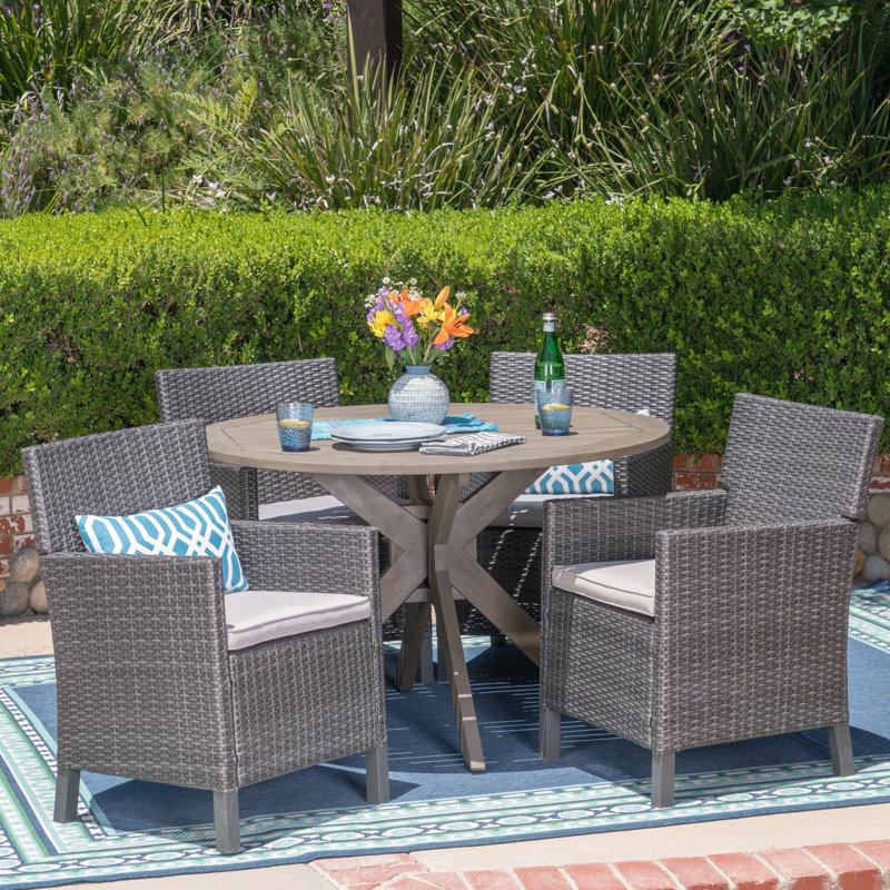 Lubuklinggau 4 - Person Acacia Wicker Patio Dining Set with Round Table