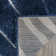 Ashal Abstract Blue/Cream Area Rug