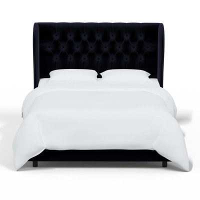 Tomey Upholstered Wingback Bed