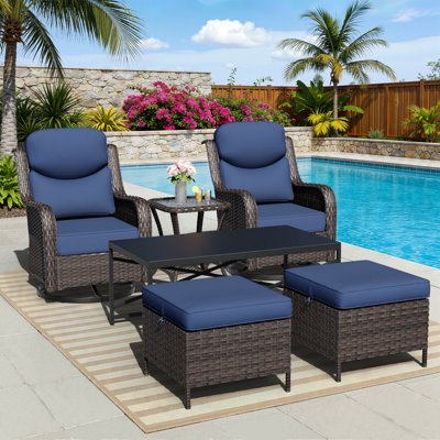 Adcox 2-Person Outdoor Rattan Patio Furniture Set with Swivel Chairs,Ottomans,Tables and Blue Cushions