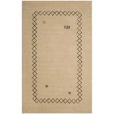Tapis beige en laine tissé à la main à motif géométrique Coraima